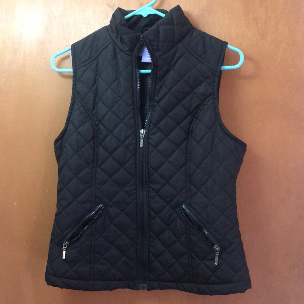Small black vest.